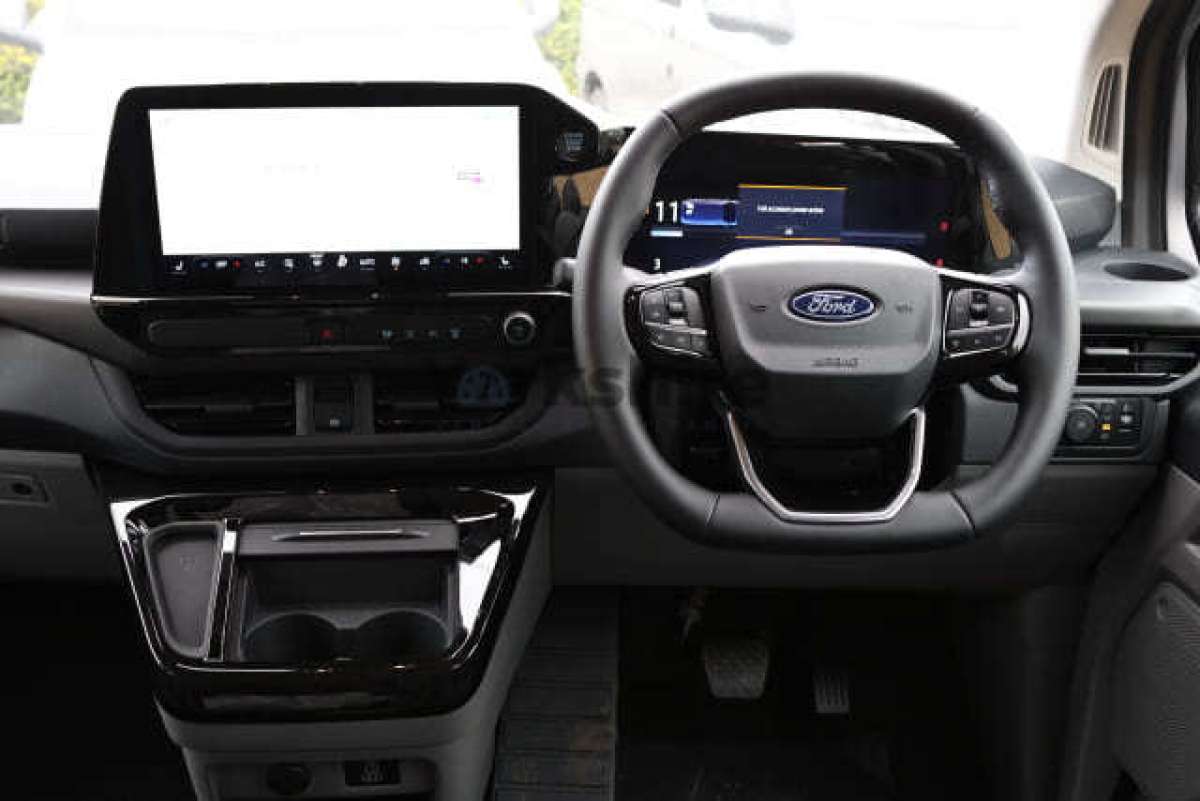 This is the Transit 320 Custom L1H1 DCiV Sport Hybrid vehicle.